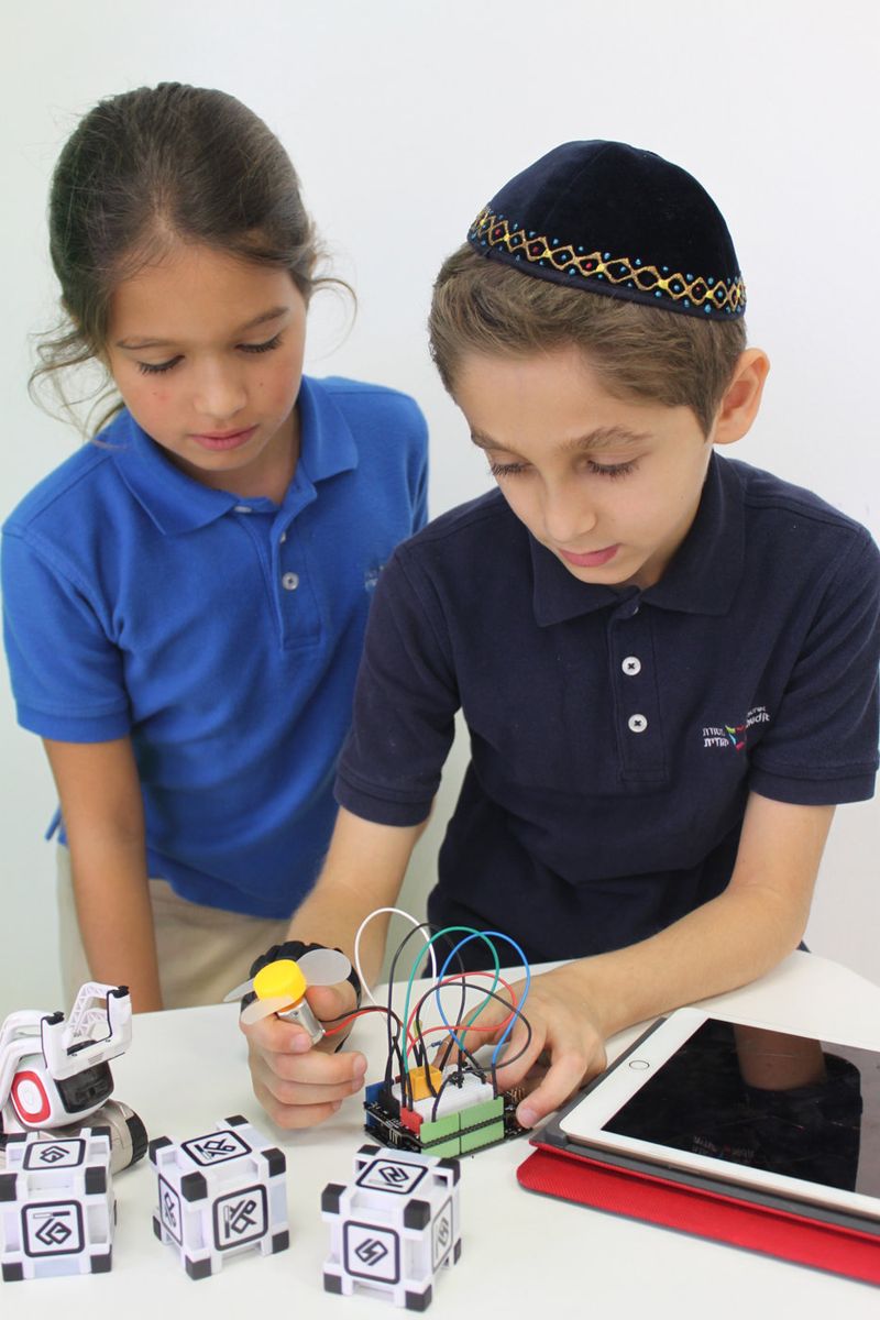 Students with robotics kit